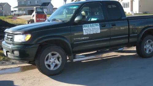 Grace Electric service truck parked at a job site